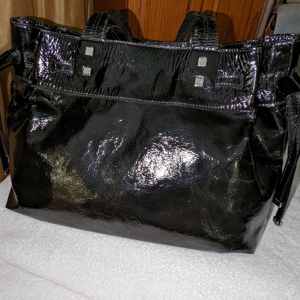 Black patent leather shoulder bag by Nordstrom.